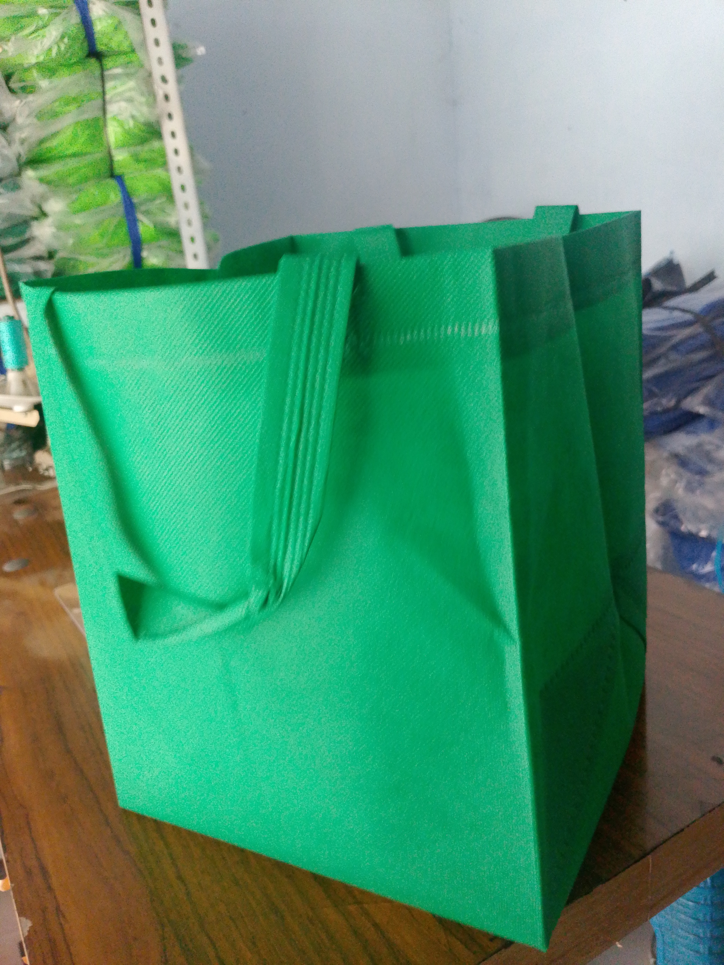 Tas Hajat pres polos hijau tua box 22
